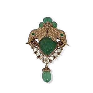 Emerald heart elephant brooch and pendant by Abaran Timeless Jewellery featuring two diamond elephants, carved emerald centre and gemstone drop.