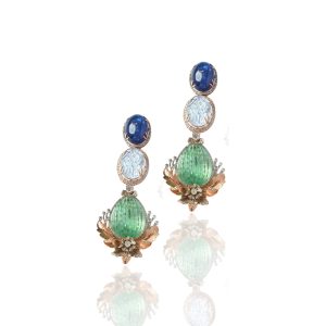 Long drop earrings with blue, white and green gemstones accented by rose gold leaf motifs and diamonds.