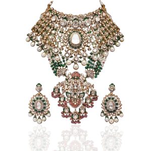 Elaborate polki choker set with pearls and green accents by Kay’s Jewels on a black background.