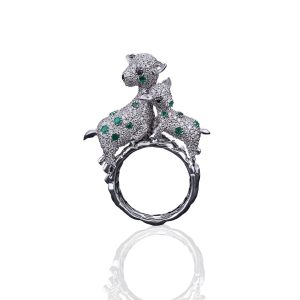 Twin diamond animal motif ring with green gemstone accents in white gold