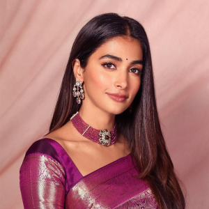 Pooja Hegde wearing ruby bead choker necklace and earrings by Akoya Jewels with a purple silk saree.