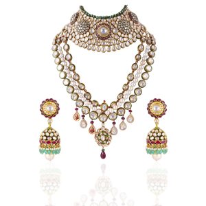 Layered polki and pearl bridal necklace set by Karan Kothari Jewellers.