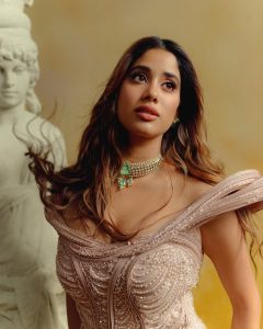 Janhvi Kapoor wearing an emerald and polki choker with uncut diamonds by Raniwala 1881 styled with a pastel ensemble.