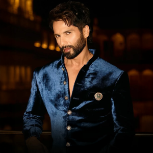 Shahid Kapoor wearing a velvet bandhgala with a gemstone brooch featuring jewellery by Raniwala 1881.