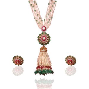Raabya polki and pearl necklace with tassel pendant and matching earrings by Shubham Motiwala & Jewellers.