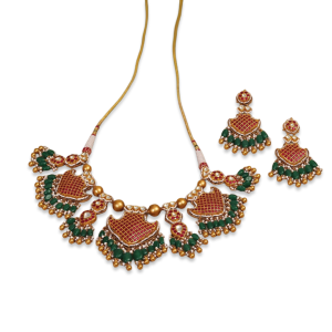 Polki style gold necklace with green beads and matching earrings by Tanishq.