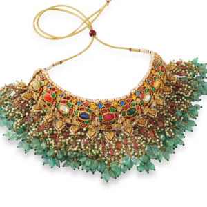 Multi gemstone gold choker with emerald beads, pearls and intricate kundan setting by Jewels by Jagdish.