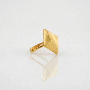 Geometric pyramid shaped gold statement ring from AJB Fine Jewels’ latest gold jewellery collection photographed on a white background.