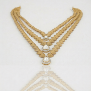 Three strand textured gold necklace with polki diamond centre motifs from AJB Fine Jewels’ latest jewellery collection.
