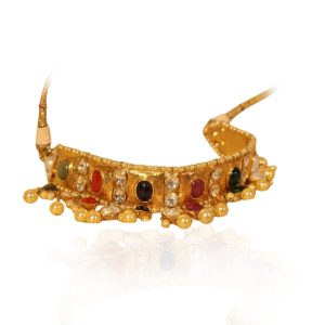 Navratna gold choker with pearls and gemstone settings by Navrattan Jewellers.