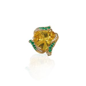 Yellow gemstone cocktail ring with emerald and diamond accents by Zoya.