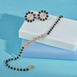 Bracelet mangalsutra with heart design and matching earrings by Kisna Diamond & Gold Jewellery