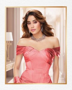 Janhvi Kapoor wearing diamond necklace with blue gemstones and matching earrings by Kalyan Jewellers