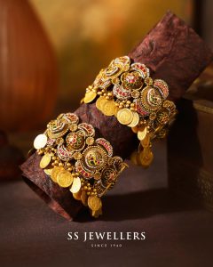 Gold bangles with coin detailing and textured finish by SS Jewellers
