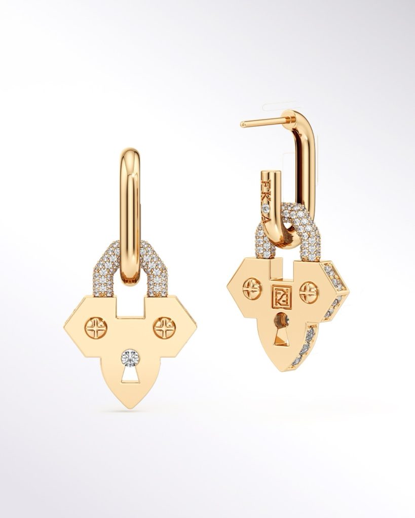 Lock motif gold earrings by Farah Khan World with layered gemstone necklace by Akshaya Gold and Diamonds