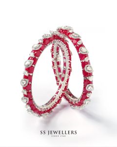 Diamond and ruby bangles with alternating stone clusters by SS Jewellers