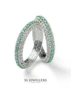 Emerald and diamond bangles with pavé setting by SS Jewellers