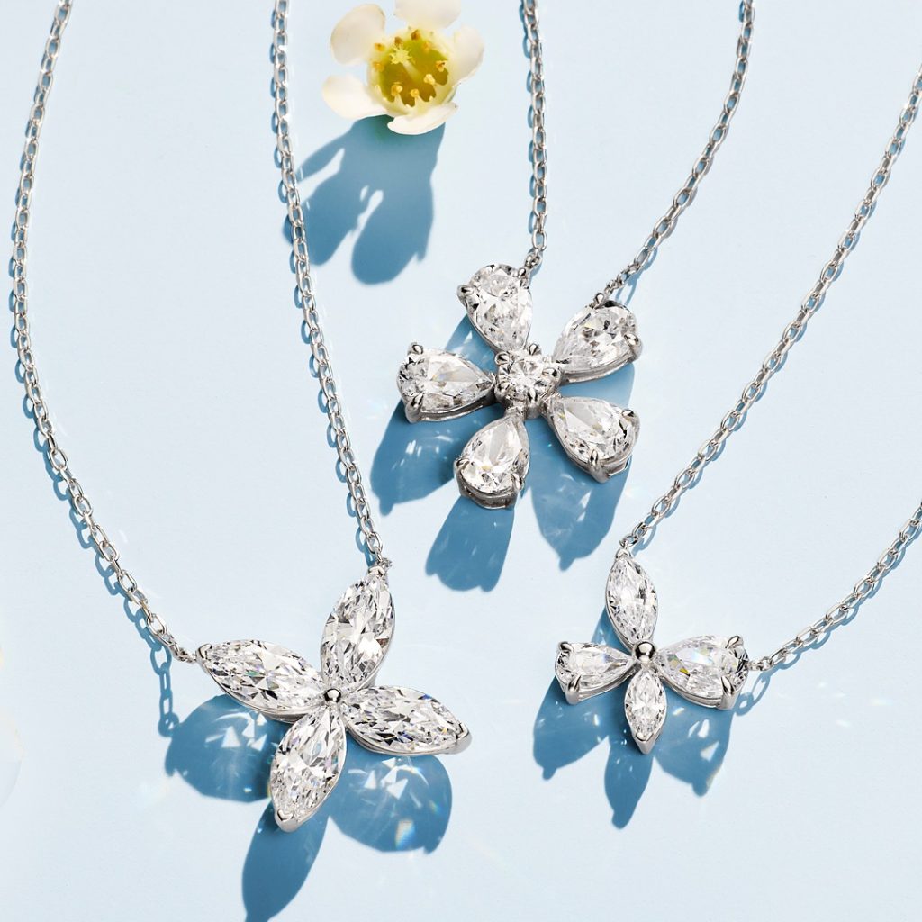 Floral gemstone earrings by R Narayan Jewellers and diamond floral necklace by Irasva Fine Jewellery styled for summer