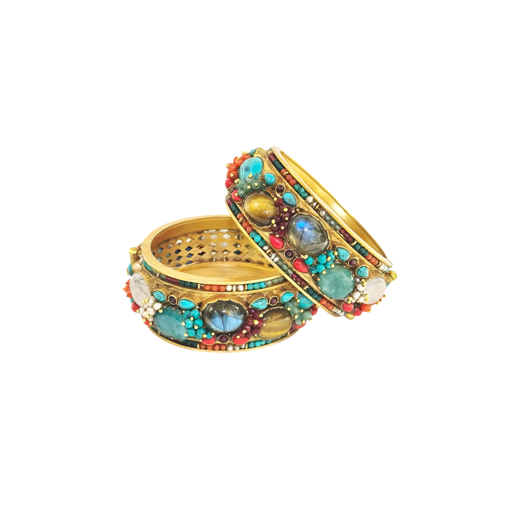 Genelia D’Souza wearing stacked multicolour gemstone bangles by Jagdish Jewellers