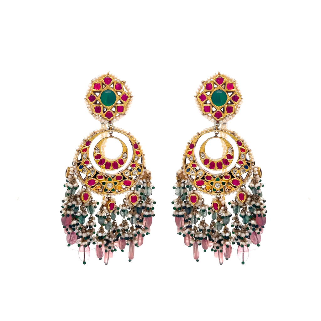 Karisma Kapoor wearing polki dangler earrings with intricate gold work by Jagdish Jewellers