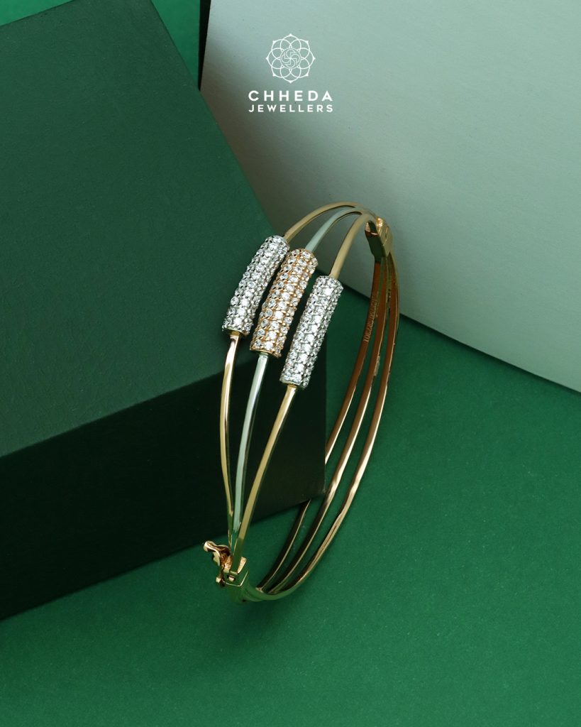 Gold malachite choker by Mirari Jewels paired with sleek diamond bangle by Chheda Jewellers