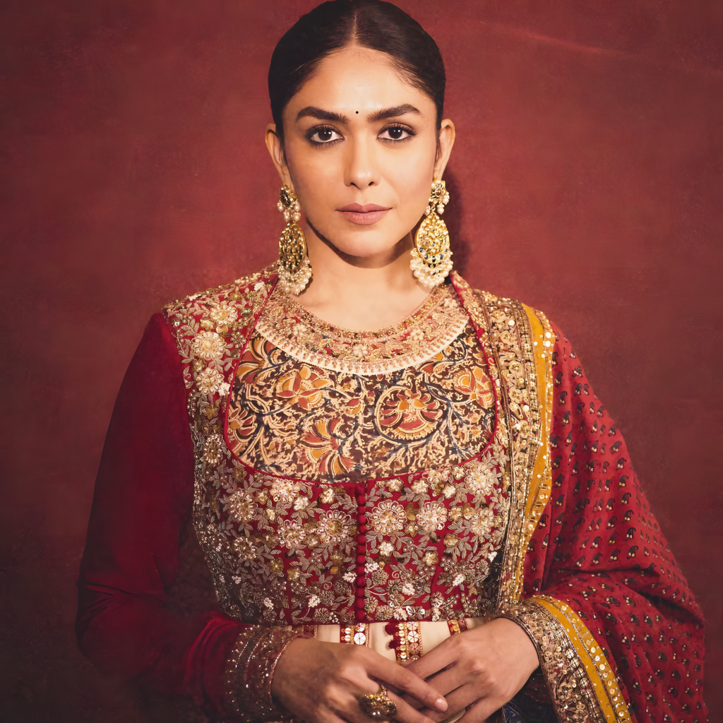 Mrunal Thakur wearing polki chandbali earrings with pearl drops and enamel ring by Jagdish Jewellers