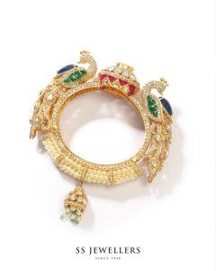 Peacock design bracelet with diamonds and gemstones by SS Jewellers