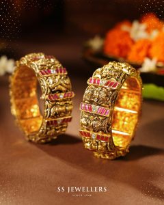 Pink enamel gold bangles with traditional motifs by SS Jewellers