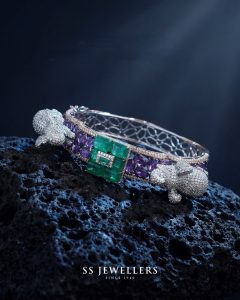 Statement gemstone kada with emerald and amethyst stones by SS Jewellers