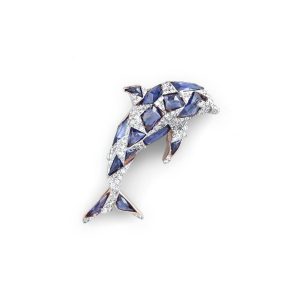 Diamond and blue sapphire dolphin brooch for men in 18kt gold by AJB Fine Jewels