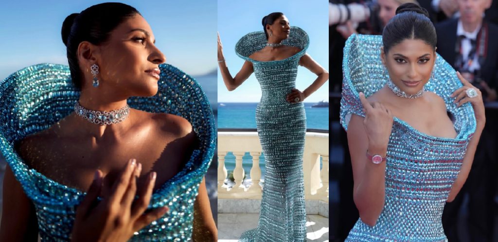 Farhana Bodi in a sculptural blue couture gown styled with a diamond choker, matching earrings and an oversized blue gemstone cocktail ring at Cannes 2026.