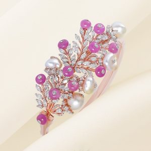 Pink sapphire pearl floral cuff bracelet with diamond detailing by Ananth Diamonds