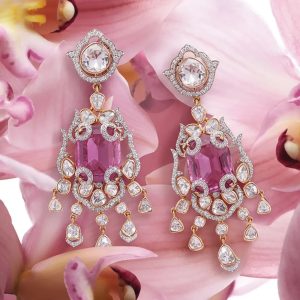 Pink sapphire and polki diamond chandelier earrings in gold by Dhirsons Jewellers