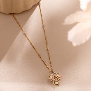 Lightweight gold necklace with polki stones in a clustered pendant design by Akshaya Gold & Diamonds