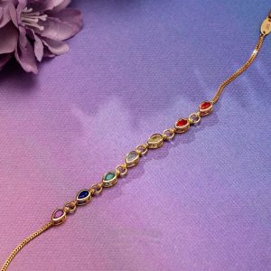 Multi colour gemstone gold bracelet with bezel set stones by Akshaya Gold & Diamonds