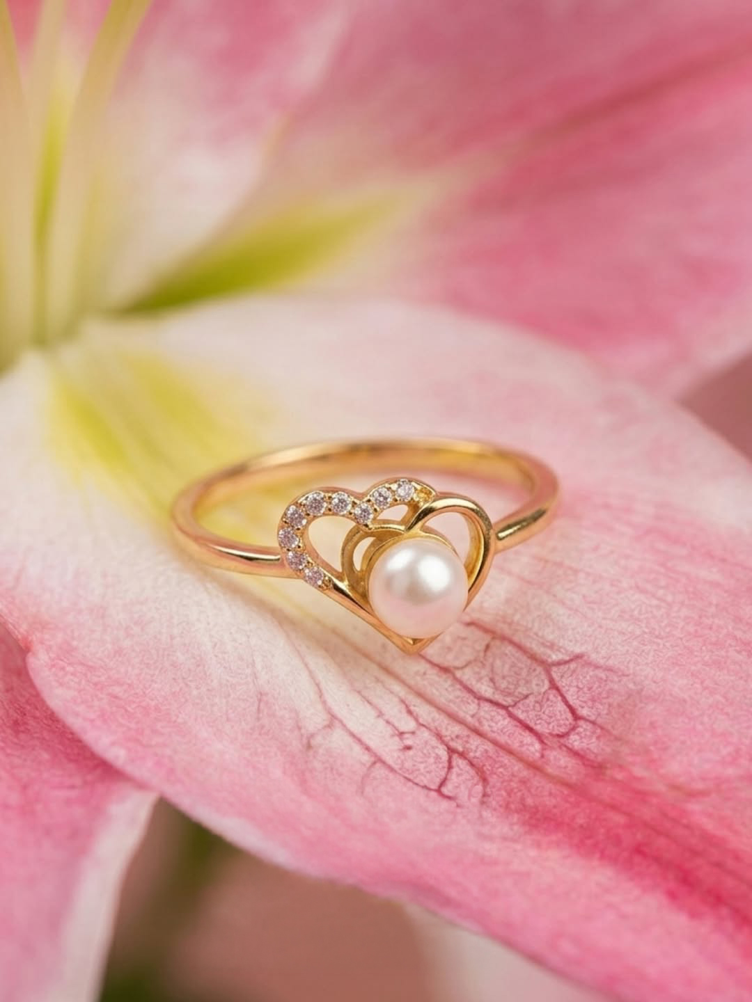 Heart-shaped gold ring with pearl and diamond accents from The Pearl Edit by Sanya Fine Jewellery by Abaran