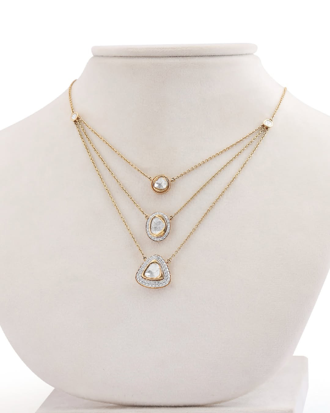 Layered Polki necklace featuring contemporary diamond halo settings