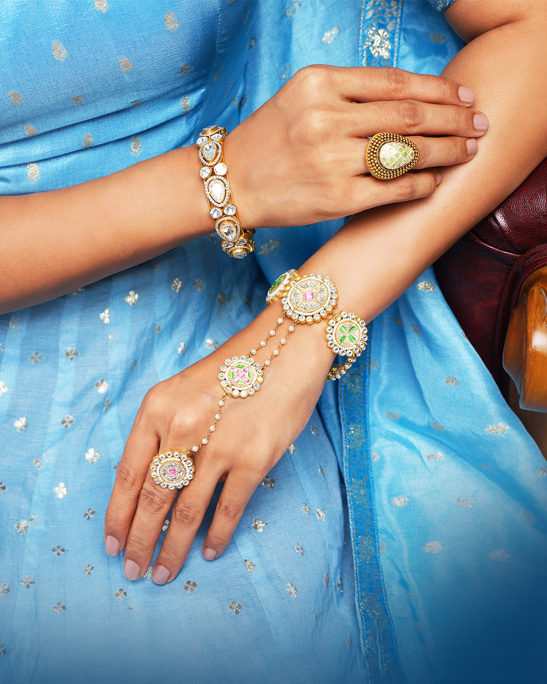 Bridal haathphool by City Gold with colourful gemstone accents, intricate motifs, and traditional handcrafted detailing