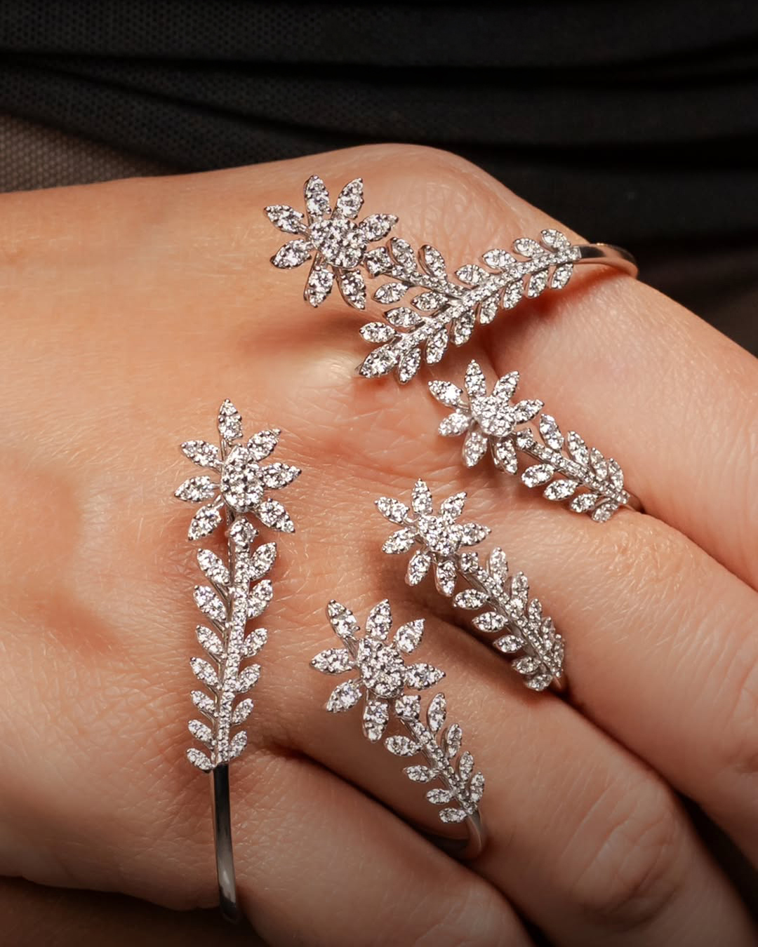 Floral diamond rings by Varaa Shree Jewels featuring leaf-inspired motifs and modern bridal jewellery design