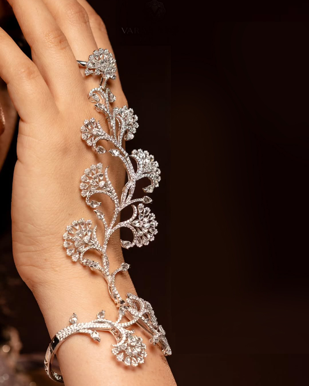 Floral diamond hand ornament by Varaa Shree Jewels designed for modern bridal jewellery styling