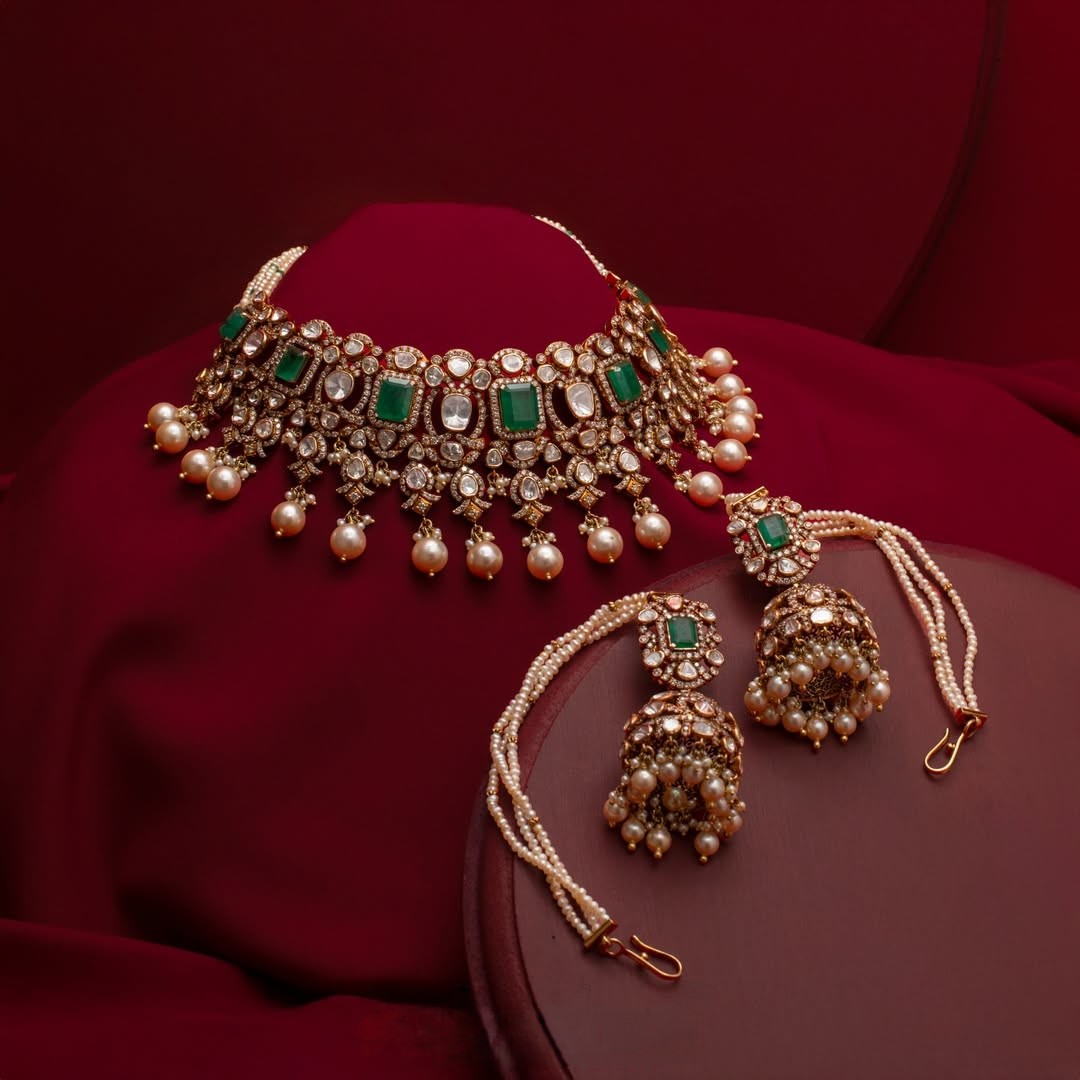 Emerald and polki diamond bridal choker with pearl drops, matching jhumka earrings and passa by AabushanJewellery1941.