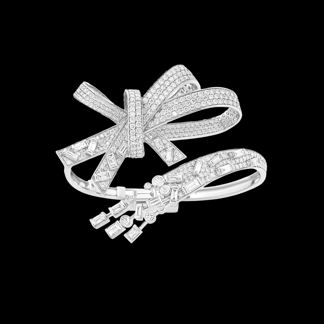 Amaris Fine Jewels The Aurora Bow natural diamond bracelet featuring sculptural ribbon loops and geometric diamond details