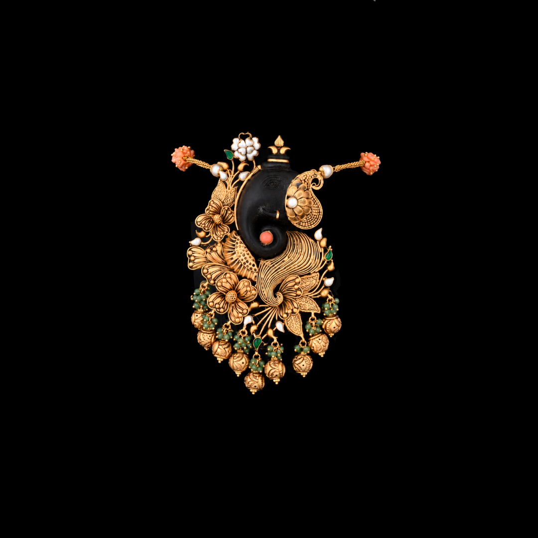 Harsahaimal Shiamlal Jewellers Divine Beginnings bridal armlet featuring Lord Ganesha and intricate floral motifs. 