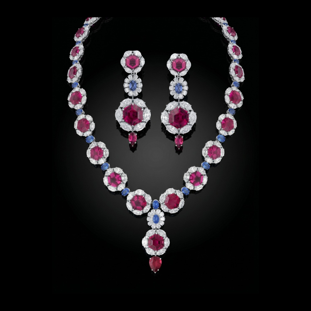 Hazoorilal Legacy Where Flowers Find Light bridal statement necklace and earrings featuring vivid red, blue and white gemstones.