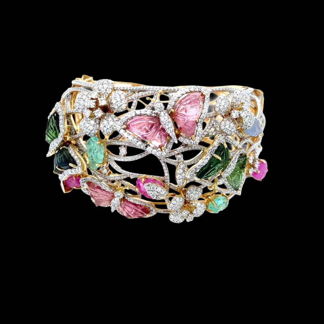Garden of Dreams coloured gemstone bracelet by Jet Gems Fine Jewellery featuring floral motifs, carved foliage and butterflies.