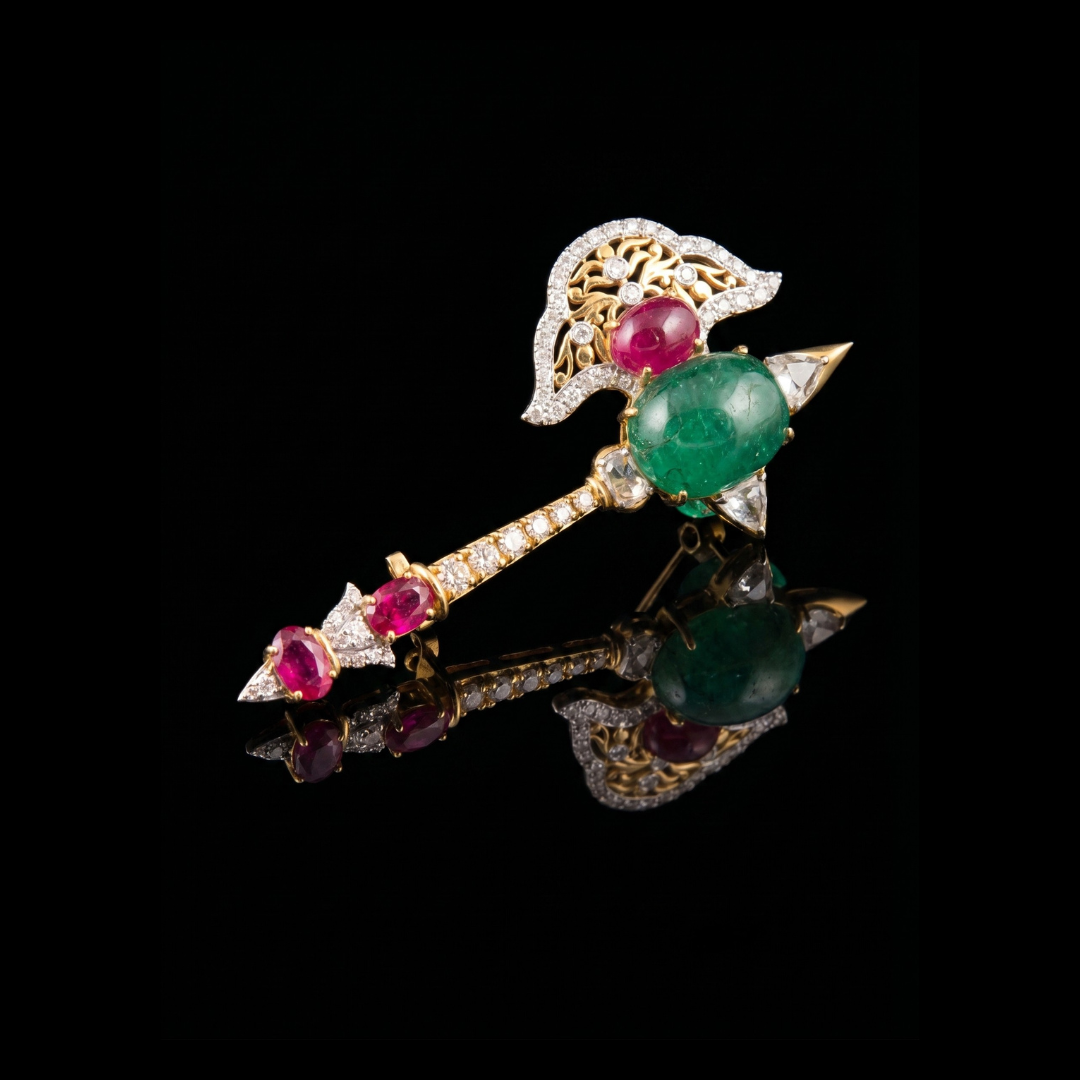 Karan Kothari Jewellers The Imperial Farasa bridal brooch featuring green and ruby-toned gemstones with diamond detailing. 