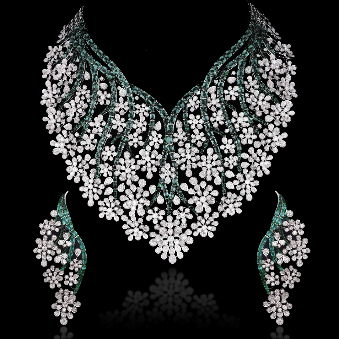 Bridal diamond necklace with cascading jasmine motifs and emerald accents by Khurana Jewellery House
