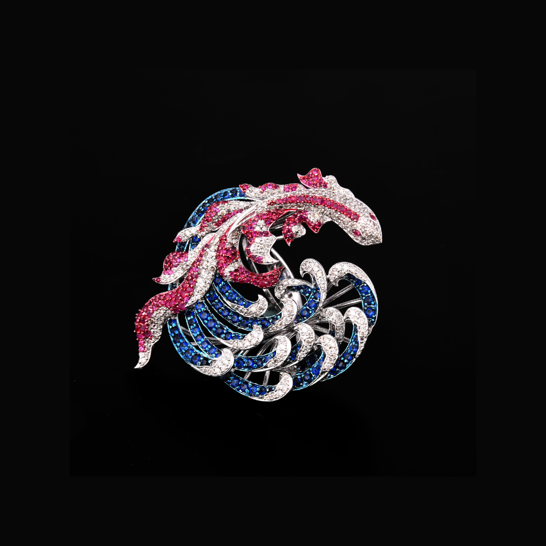 Ribbons of The Sea ring by Khurana Jewellery House featuring a sculptural sea creature in blue, pink and white gemstones.