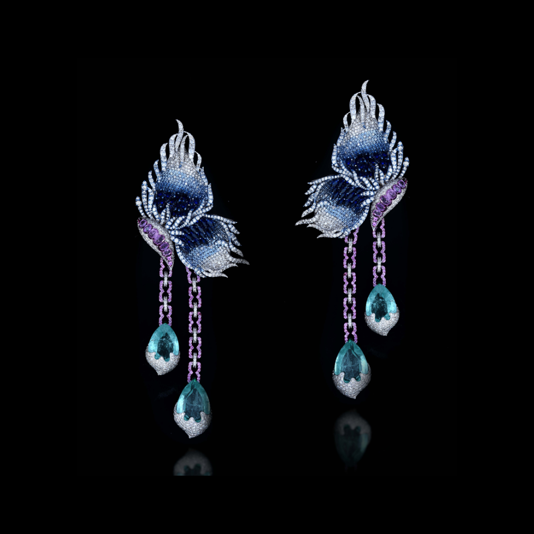 Khurana Jewellery House Celestial Wings earrings with blue and violet wing-inspired forms and dangling gemstone drops. 