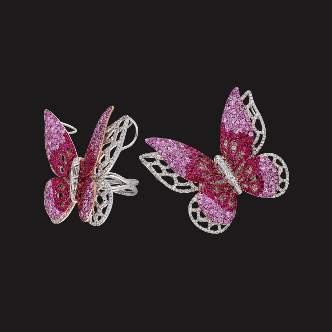 Faded Crimson Wings butterfly ring by Kashi Jewellers featuring crimson pink gemstones and intricate lace-inspired detailing.